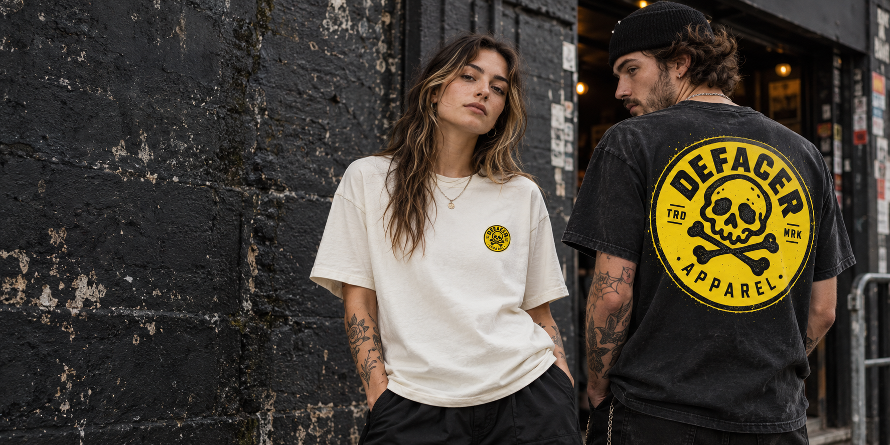 Models wearing black and off-white DEFACER T-shirts